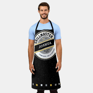 Delantal del maestro de la parrilla papá en negro