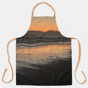 Delantal Desde el anochecer hasta el crepúsculo en la playa