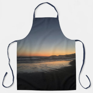 Delantal Desde el anochecer hasta el crepúsculo en la playa