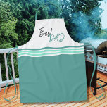 Delantal Día del Padre con el mejor guión turquesa moderno<br><div class="desc">Mejor Apron del Día del Padre con escritura turquesa moderna. Moderno delantal con el mejor papá en un guión de moda. El diseño tiene rayas de diferentes colores turquesa. Gran idea de regalo para un padre,  especialmente en el Día del Padre y cumpleaños.</div>