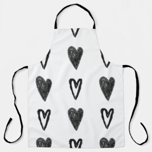 Delantal Diseño gráfico sin fisuras con corazones. Blac