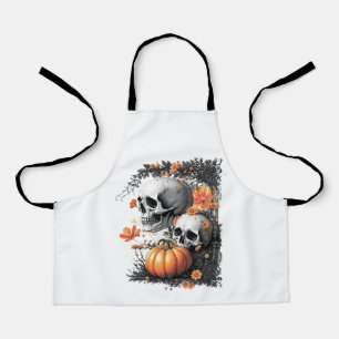 Delantal Dos cráneos y una calabaza entre las flores.