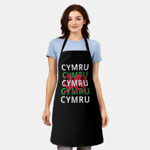Delantal Dragón galés rojo Cymru repitiendo el texto raíces
