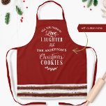 Delantal El amor, la risa y los Navidades Cookies y Stripes<br><div class="desc">Atractivo delantal rojo de festividad de vacaciones con la divertida frase "Todo lo que necesitas es amor, risa y -tu nombre/apellido/nombre de negocio- Navidades Cookies" en una mezcla de caligrafía escrita a mano y tipografía en bloques. Abajo con estribos festivos en rojo, oro y blanco. Las invitaciones a fiestas de...</div>