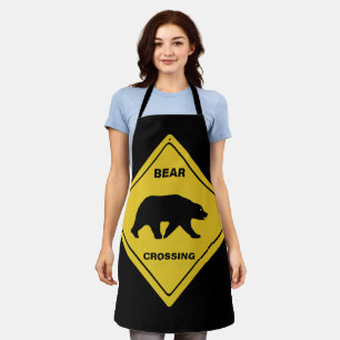 Delantal El oso de SlipperyJoe cruzando la silueta del oso 