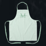 Delantal Elegant Monogram Name Green Stripe<br><div class="desc">Add a touch of elegance to everyday cooking and baking with this feminine personalized apron. Featuring a soft green and white striped background, this stylish apron is beautifully finished with your initial and name in a fancy script font, creating a timeless and sophisticated look. Perfect for home cooks, bakers, entertainers,...</div>