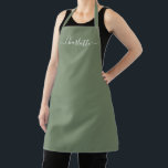 Delantal Elegante nombre de guión personalizado verde oliva<br><div class="desc">Delantal de cocina de texto de monograma de guión moderno personalizado verde oliva sólido color simple femenino elegante chic verde oliva y blanco. Personalice,  personalícelo con nombre,  cita,  frase o texto. Ideal para cocineros,  chefs,  alfarería,  cerámica,  manualidades,  trabajo,  cocina,  repostería,  barbacoa,  parrilla,  etc</div>