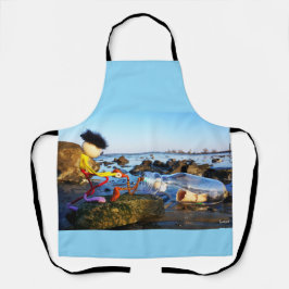 Delantal Fubby met flessenpost aan de kust.