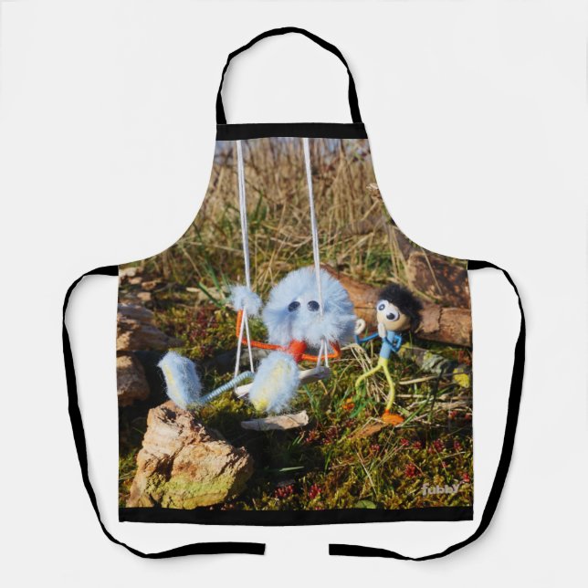 Delantal Fubby monster op de schommel. (Anverso)