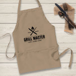 Delantal Funny BBQ Grill Master Barbacoa Personalizada King<br><div class="desc">A tu maestro de parrilladas le encantará este delantal personalizado. El diseño incluye un tenedor de barbacoa cruzado y un cuchillo con una llama de fuego encima. Añade el nombre y el año de su Grill King (matrimonio, residencia, etc.) Perfecto para tu comida favorita, el día del padre, la barbacoa...</div>