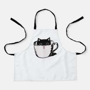 Delantal Gatito negro con nariz roja escondido en una taza
