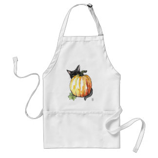 Delantal Gato negro detrás de la zapatera de calabaza