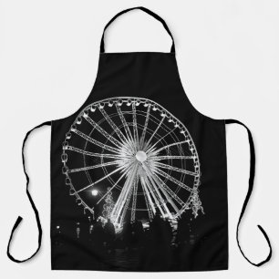 DELANTAL GENTE CERCA DE FERRIS WHEEL