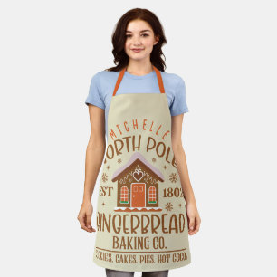 Delantal Gingerbread Baking Co. personalizado del Polo Nort