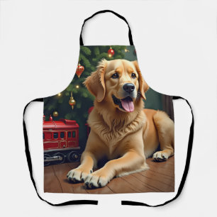 Delantal Golden Retriever junto al tren de juguete de Navid