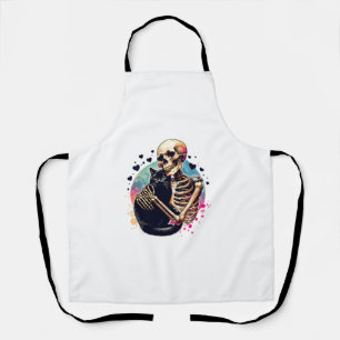 Delantal Gracioso Skeleton Cudddling con un Skul acuarela d