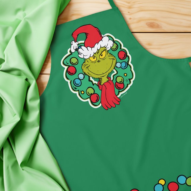 Delantal Grinch | Navidades de la guirnalda de vacaciones (Apron on table)