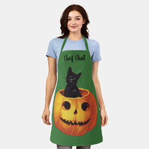 Delantal Halloween antiguo, gato negro lindo en una calabaz