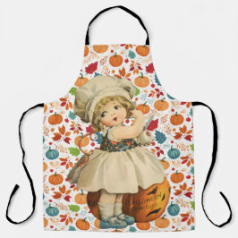 Delantal Halloween de la chica tallando manzanas y calabaza