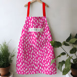 Delantal Hot Pink Dashing Apron<br><div class="desc">Luminoso y alegre,  este delantal de colores vivos presenta guiones dibujados a mano para un juego de patrones durante todo el año. Personaliza con tu propio nombre o dá como un regalo práctico y atento!</div>