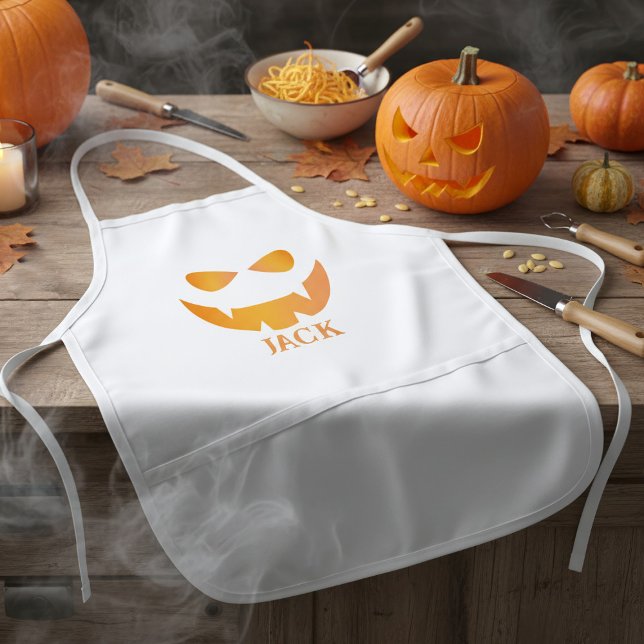 Delantal Infantil Halloween Cara de calabaza infantil personalizada (Perfect apron for your pumpkin carving party. Add your name)