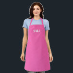 Delantal Iniciales monopólicas modernas de color blanco ros<br><div class="desc">Personalice las iniciales del monograma personalizado letras blancas de color rosa cálido Apron, fondo rosado caliente, puede elegir su color de correa gran regalo para mamá, papá, amigos y usted mismo! Diseño moderno, minimalista, sencillo y elegante. Excelente para cocineros, chefs, cerámica, artesanía, trabajo, cocina, horneado, barbacoa, parrilladas, comercios y tiendas,...</div>