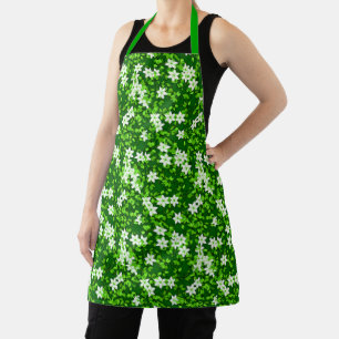 Delantal Jazmín blanco entre hojas verdes