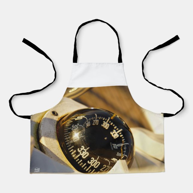 Delantal Kompas helpt navigeren en koer behouden.  (Anverso)