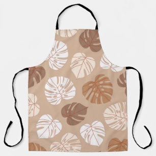Delantal La monstera beige deja un patrón ininterrumpido. T