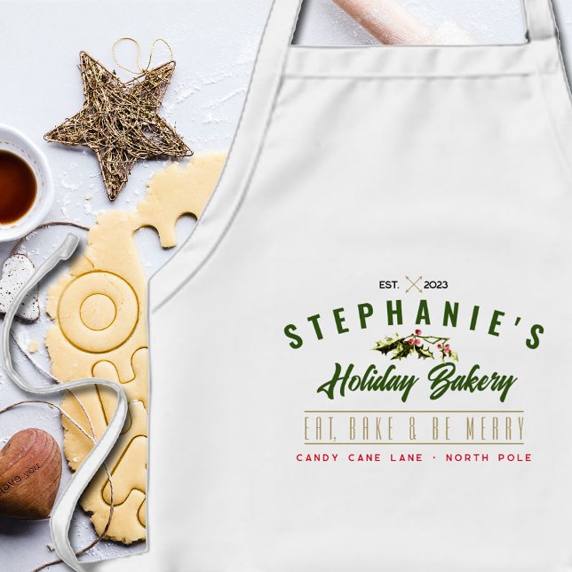 Delantal Largo Logo de Navidades de vacaciones haciendo panadería (Close up detail of the personalized bakery logo on this holiday baking apron.)