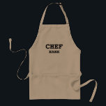 Delantal Mentes de cocina del chef personalizadas<br><div class="desc">Cocine con estilo con este Aprón Adulto Personalizado de Cocina del Chef. El diseño es moderno y sencillo, con el texto "chef" en negrita y negro en el centro. El nombre está en las letras más pequeñas a juego debajo del chef. PULSE PERSONALIZAR LA OPCIÓN PLANTILLA E INTRODUCIR EL NOMBRE...</div>