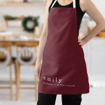 Delantal Minimalista cita divertida nombre Navidades de Bor<br><div class="desc">Minimalista Cita Divertida Llama Navidades Borgoña. Elegancia simple con este diseño totalmente personalizable. Personalice fácilmente con su nombre y mantenga la cita temática festiva Sleighing it in the Kitchen o cambie según sea necesario. El texto,  el fondo y las correas se pueden cambiar a cualquier color que elija.</div>