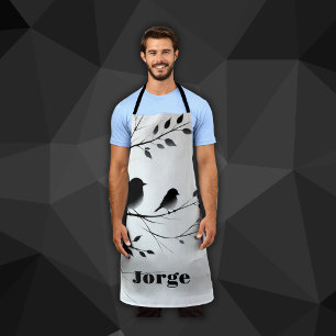 Delantal Monograma Aves simples blancas y negras en árboles