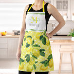 Delantal Monograma moderno rústico limón acuarela polo punt<br><div class="desc">Aquí hay una manera maravillosa de añadir a la diversión del hornear. Añade brillo extra a tus aventuras culinarias cuando usas este bonito, moda, moderno, moderno y personalizado delantal. Limones de color fresco, rústico, de campo y hojas verdes, junto con la tipografía de escritura manuscrita verde pasto, superponen puntos de...</div>