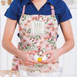 Delantal Monograma Nombre Cerezo Blossom Agua Flora<br><div class="desc">Este moderno diseño presenta un diseño floral de color bonito rosa cerezo Blossom. Personalice su monograma y nombre editando el texto en el cuadro de texto proporcionado.</div>