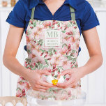 Delantal Monograma Nombre Cerezo Blossom Agua Flora<br><div class="desc">Este moderno diseño presenta un diseño floral de color bonito rosa cerezo Blossom. Personalice su monograma y nombre editando el texto en el cuadro de texto proporcionado.</div>
