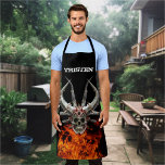 Delantal Monograma Nombre Skull Flaming Fire<br><div class="desc">Este diseño se puede personalizar eligiendo la opción personalizar para añadir texto o realizar otros cambios. Si este producto tiene la opción de transferir el diseño a otro artículo, asegúrese de ajustar el diseño para que se ajuste si es necesario. Contáctame en colorflowcreations@gmail.com si deseas tener este diseño en otro...</div>