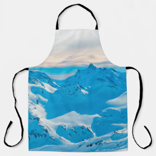 Delantal Montañas con picos de nieve y nieve al atardecer,a