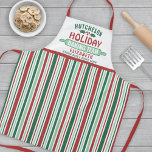 Delantal Navidades de Holiday Baking Team Cookie Fiesta a r<br><div class="desc">Celebra el tiempo juntos en casa en la cocina con un delantal de Holiday Baking Team personalizado de rayas rojas y verdes. Todo el texto de esta plantilla es sencillo para el personalizar. El diseño presenta rayas verticales rojas, verdes y blancas, hojas y bayas lindas y huecas, clavija rodante, nombre...</div>