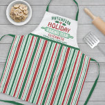 Delantal Navidades de Holiday Baking Team Cookie Fiesta Gre<br><div class="desc">Celebra el tiempo juntos en casa en la cocina con un delantal de Holiday Baking Team personalizado de rayas rojas y verdes. Todo el texto de esta plantilla es sencillo para el personalizar. El diseño presenta rayas verticales rojas, verdes y blancas, hojas y bayas lindas y huecas, clavija rodante, nombre...</div>