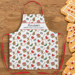 Delantal Navidades personalizados Personalizado del equipo<br><div class="desc">Celebra la temporada de fiestas y los grandes tiempos que pasamos juntos horneando galletas de navidades. Este divertido delantal presenta un patrón de cookies de navidades y dos líneas de texto personalizado. Agrega tu apellido, el nombre de la abuela, una ubicación y mucho más. Ideal para las familias que hornean...</div>