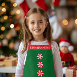 Delantal Navidades Red Green de Peppermint<br><div class="desc">Nombre personalizado con color de fondo personalizado y banda para su nombre con 3 caramelos de menta de menta; dibujos originales de Becky Nimoy</div>