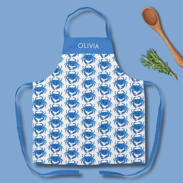 Delantal Nombre del patrón de cangrejo azul (Personalized blue crab pattern kitchen apron with white background.)