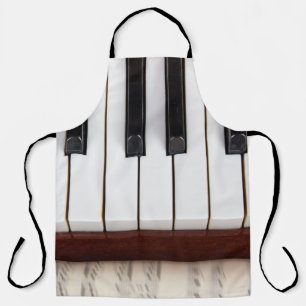 Delantal notas musicales sobre el fondo de una pianoacústic