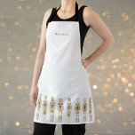DELANTAL NUTCRACKERS DE NAVIDADES DE ORO<br><div class="desc">Soldados de los elegantes petardos de oro</div>
