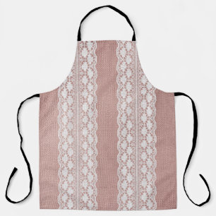Delantal Oro rosa metálico, textura de encaje blanquecino.