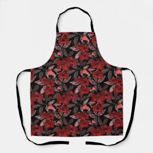 Delantal orquídeas rojas sobre negro.