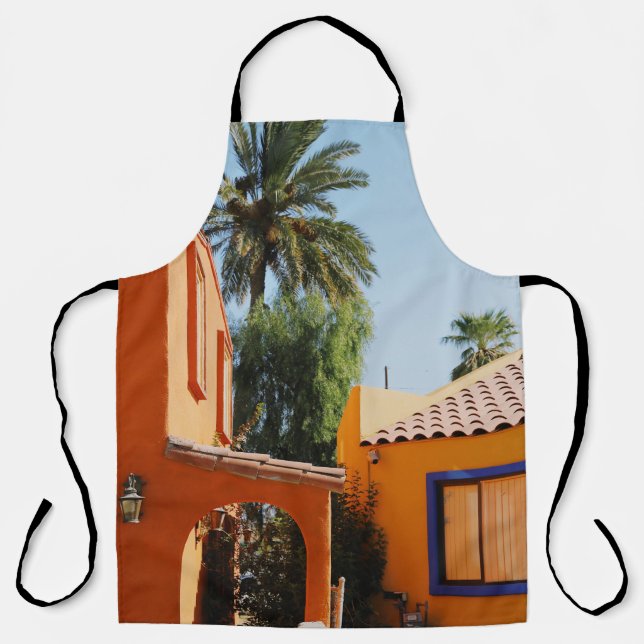 Delantal Palmera verde al lado de un edificio de hormigón m (Anverso)