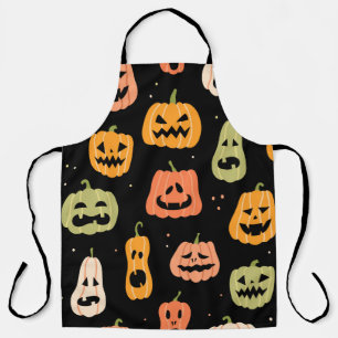 Delantal Patrón de calabaza sin fisuras de Halloween. Mano 