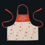 Delantal Patrón de Navidades de la tripulación de prueba de<br><div class="desc">Este divertido delantal de horneado de vacaciones presenta un patrón de galletas heladas de Navidades - un sombrero de Santa, muñeco de nieve, árbol de Navidad, un ángel, mitones y un bastón de caramelo. El texto dice, "COOKIE SATISFACIENDO A LA TRIPULACIÓN", pero se puede personalizar para decir lo que quieras....</div>